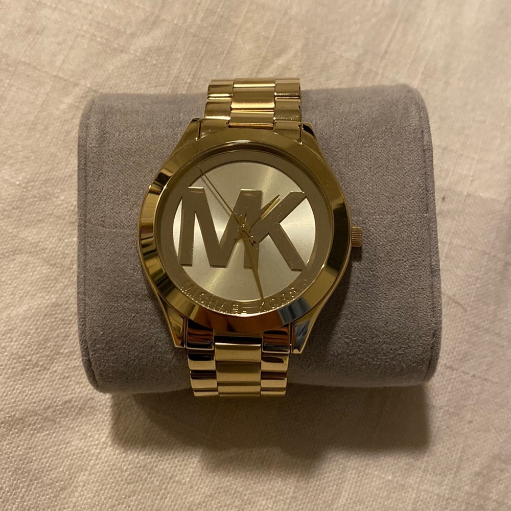 Brand New never worn gold michael kors watch